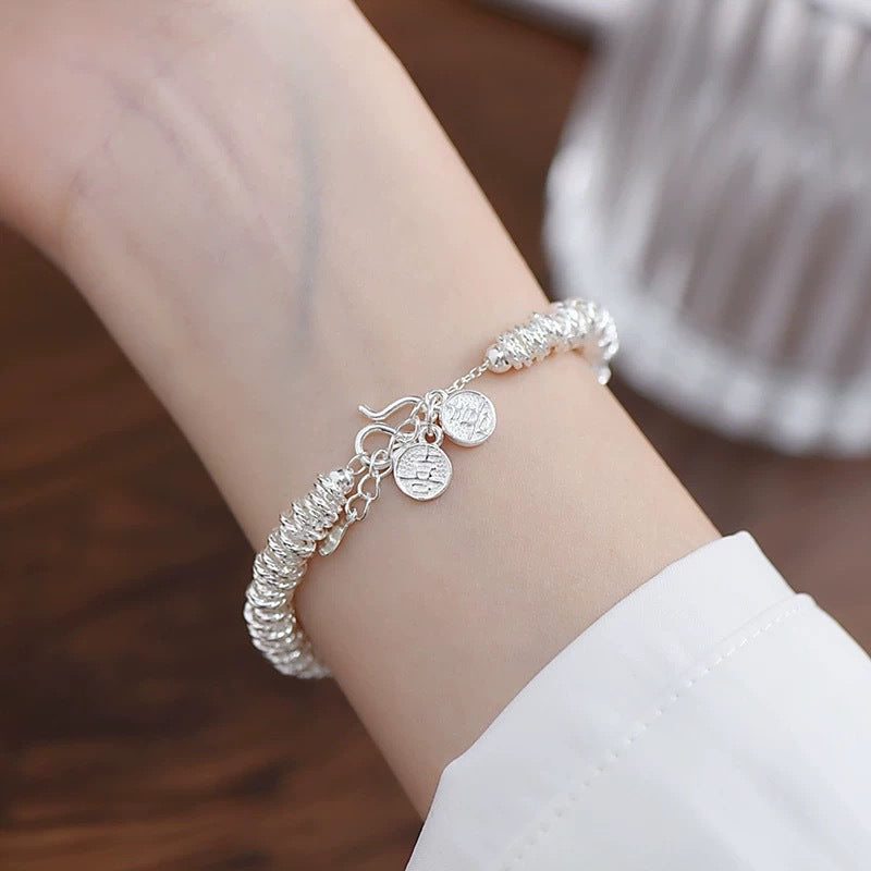 Sterling silver joy bracelet for women, fashionable handmade coiled bracelet, light luxury silver bangle, versatile silver bracelet.