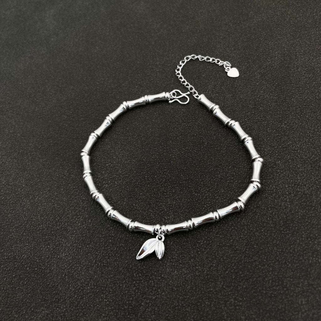 Traditional silver-plated bamboo bracelet with bamboo motifs, symbolizing peace and prosperity, and a string of bamboo leaves representing continuous advancement – a niche women's bracelet.